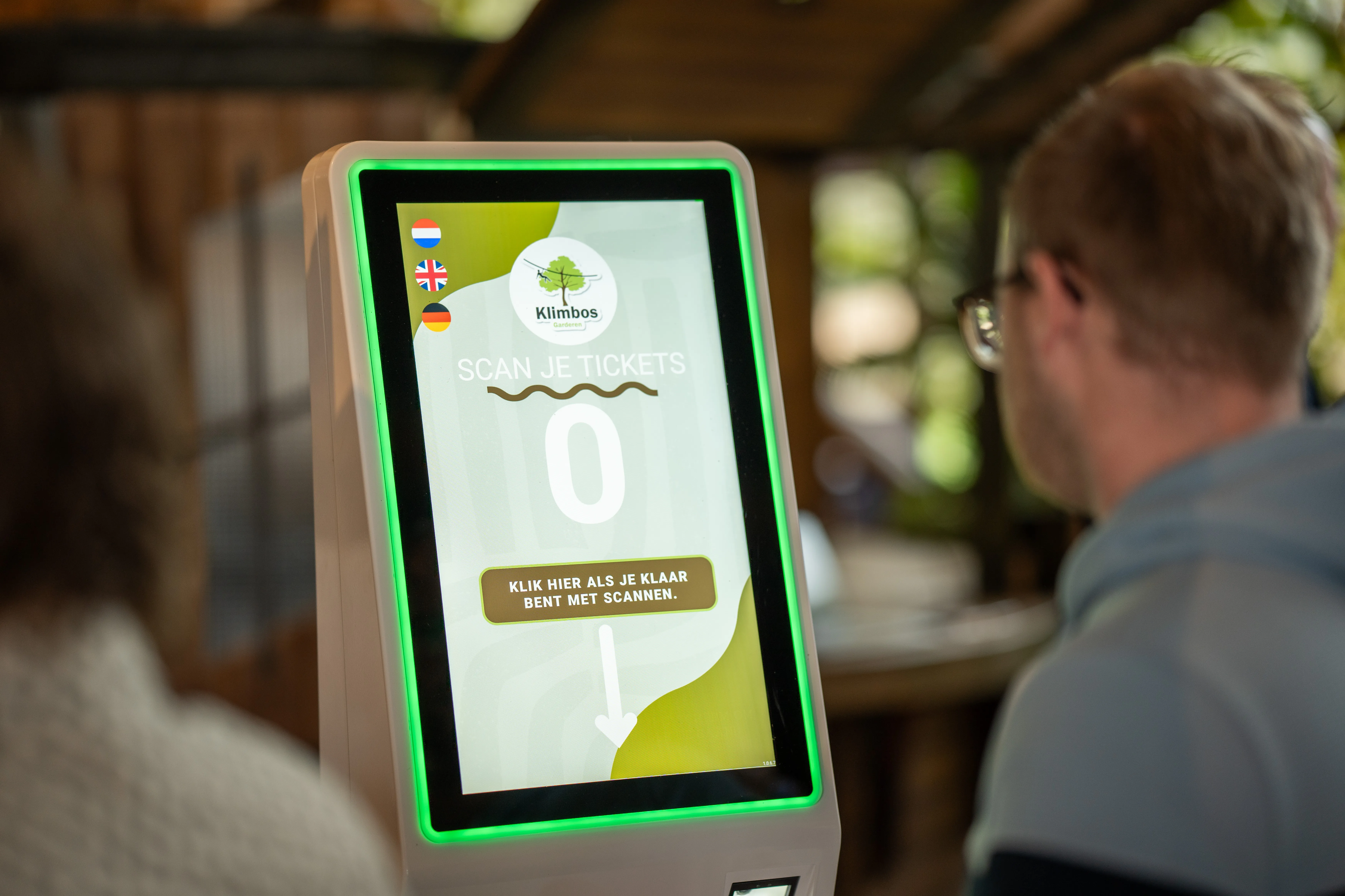 Een incheckscherm van Klimbos Garderen
